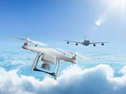 Plane misses colliding with drones