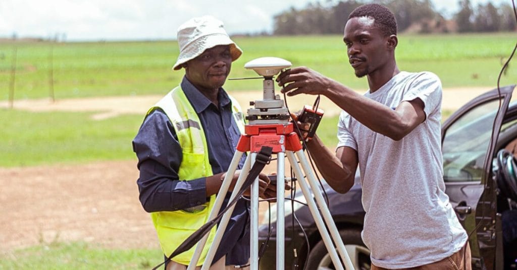 Licensed surveyor in Nigeria using GNSS and drone technology for registered land survey plan